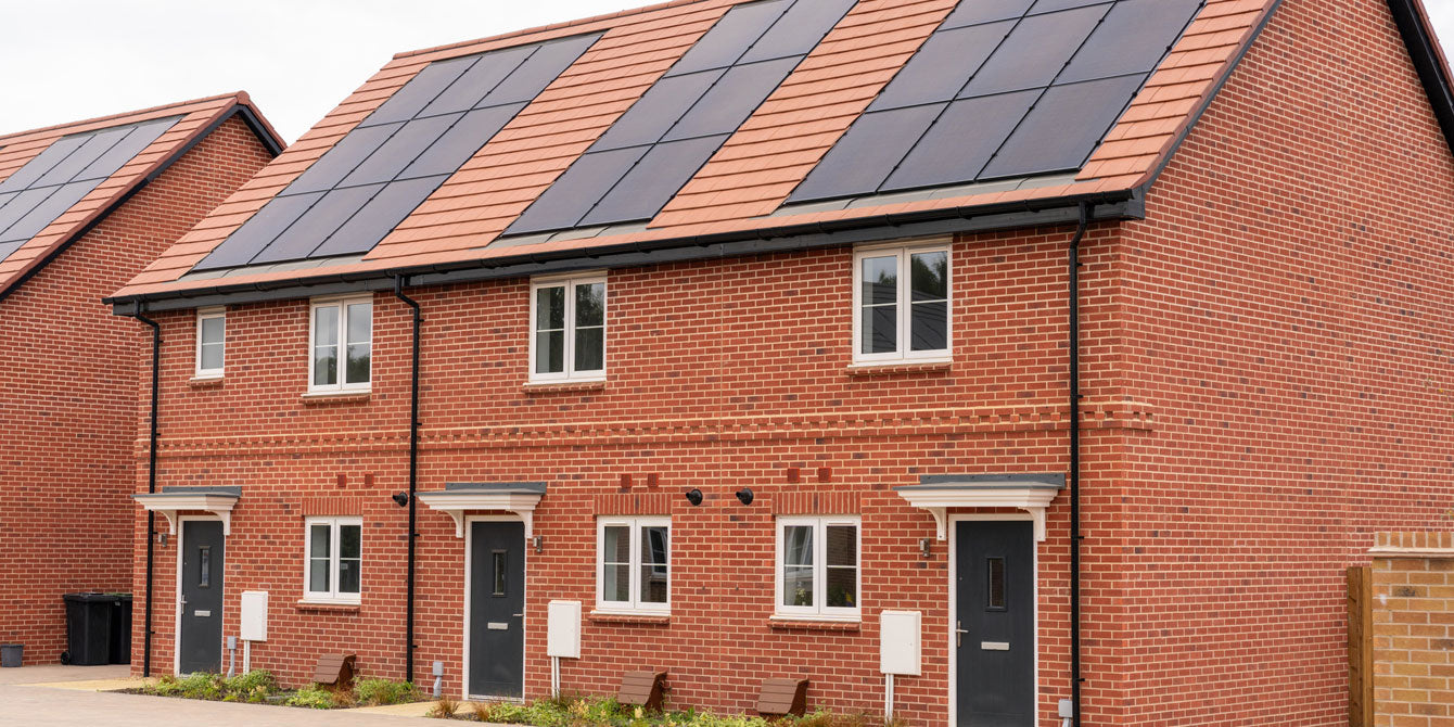 Row of houses with roof solar panels