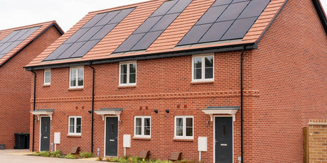 Row of houses with roof solar panels